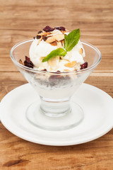 dessert cup with ice cream and red berries