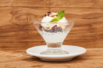 dessert cup with ice cream and red berries