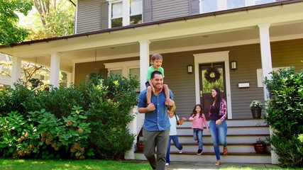 Father Gives Son Ride On Shoulders As Family Leave House - Powered by Adobe