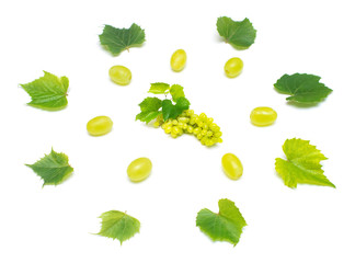 Fresh green grapes branch isolated on white background. Creative concept of fruit, butterfly shape. Flat lay, top view