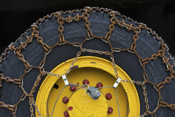 rusty snow chains on tire