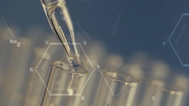 Close up of laboratory scientist working with a pipette analyzes and extract the DNA or molecules in the test tubes.on blue background with virtual interface
