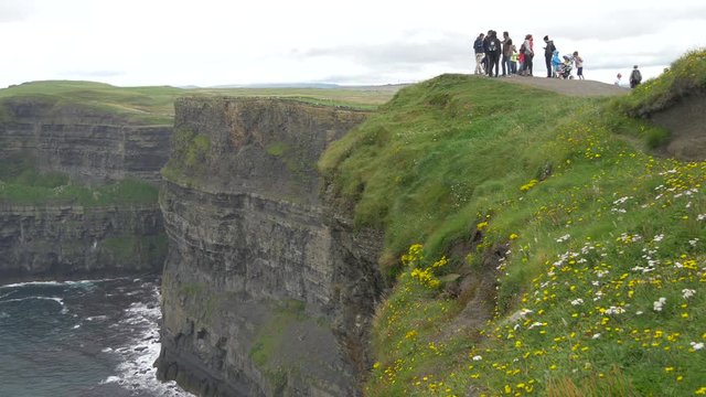 People visiting Cliffs of Moher