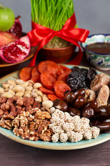 Traditional Azerbaijan sweet cuisine of holiday Nowruz: assortment of nuts and dry fruits