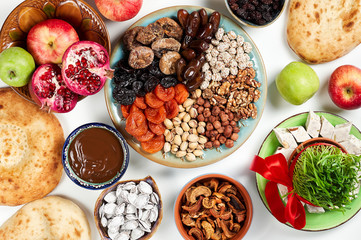 Traditional Azerbaijan sweet cuisine of holiday Nowruz. Fresh green grass samani symbol of spring