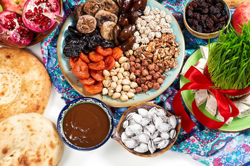 Traditional Azerbaijan sweet cuisine of holiday Nowruz. Fresh green grass samani symbol of spring