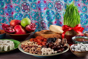 Traditional Azerbaijan sweet cuisine of holiday Nowruz. Fresh green grass samani symbol of spring