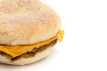 Sausage and Cheese Breakfast Sandwich on a White Background