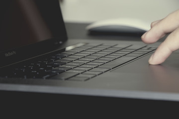 Close-up laptop keyboard with mouse