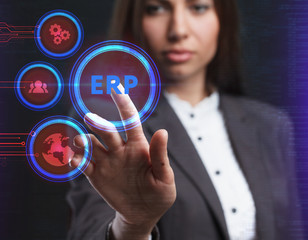The concept of business, technology, the Internet and the network. A young entrepreneur working on a virtual screen of the future and sees the inscription: ERP
