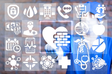 Doctor presssing heart with bricks button on a virtual touchscreen. Medical Healthcare...