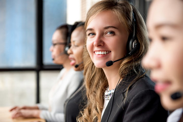 Woman customer service agent working in call center