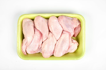 raw chicken wings package isolated on white background