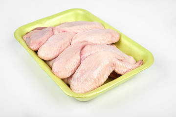 raw chicken wings package isolated on white background
