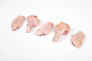 Raw chicken wings isolated on white background