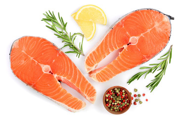Slice of red fish salmon with lemon, rosemary and peppercorns isolated on white background. Top view. Flat lay