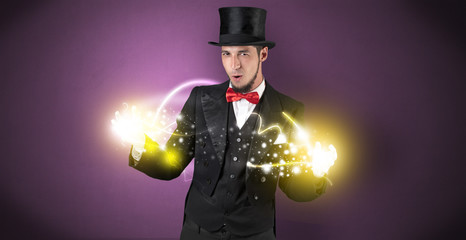 Magician holding his power on his hand