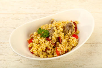 Bulgur with chicken hearts