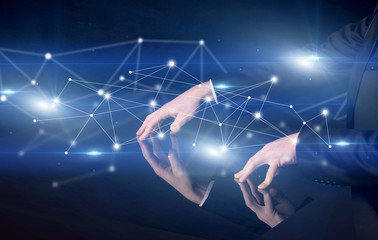 Hands touching interactive table