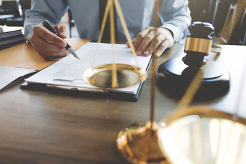 lawyer working with documents at a courtroom