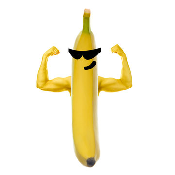 Smiling banana with glasses with strong arms. Source of protein. Concept of healthy nutrition. Isolated
