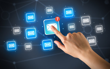 Hand touching mail icon