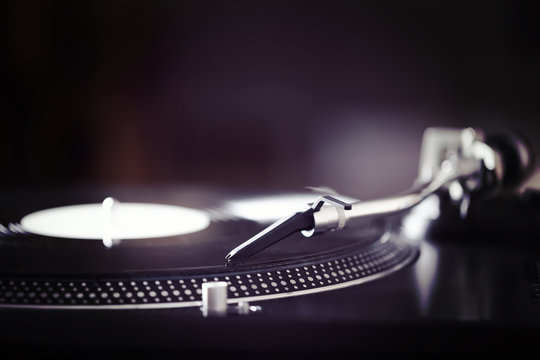 Turntable with black record and headshell