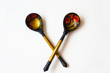 Wooden spoon with Khokhloma pattern