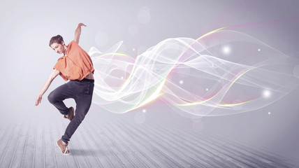 Fototapeta na wymiar Urban breakdancer dancing with white lines