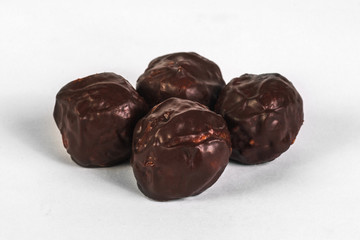 Chocolate truffles on white background