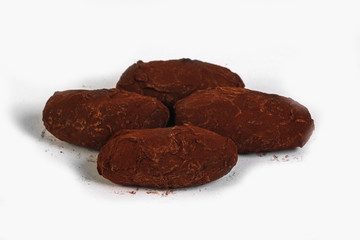 Chocolate candies on white background