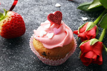 Delicious cupcake for Valentine Day. cake for Valentines day with chocolate and strawberries. Traditional homemade with red roses