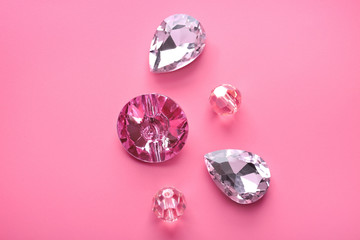 Precious stones for jewellery on color background