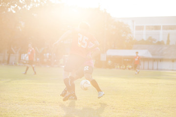 soccer with lens flare