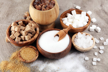 Fototapeta na wymiar Various types of sugar, brown sugar and white on table