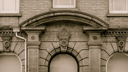 Decorated Facade of Building from 1887, Black and White Split Toning Shallow Depth of Field - 195119282