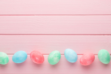 Pastel Easter eggs background. Spring greating card.