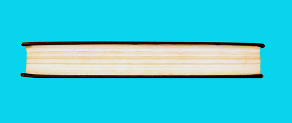 Closed book on an isolated blue background for design and decoration