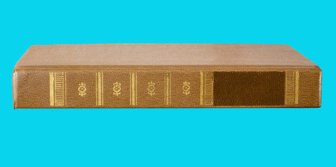  old book with  spine on  blue background, side view, for design and creativity