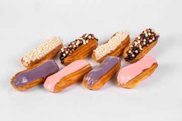 Group of french dessert Eclair on white background