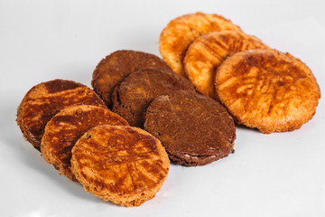 Three kinds of different cookies on white background