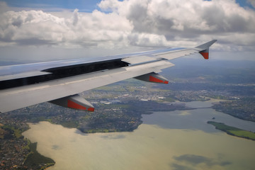 Beautiful landscape green field views from an airplane window during landing  at Auckland ...