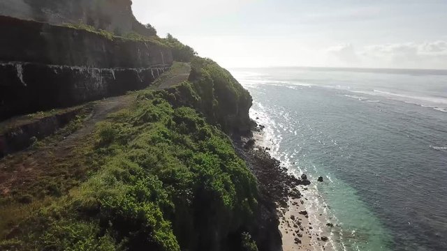 The drone takes off on Melasti beach Bali dron
