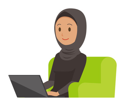 An arab woman wearing ethnic costumes is sitting on a sofa and operating a laptop computer