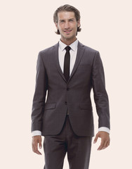 confident young businessman goes forward