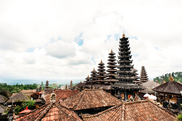 Traditional balinese roofs in Pura Penataran Agung Besakih complex, the mother temple of Bali Island, Indonesia. Travel and architecture background