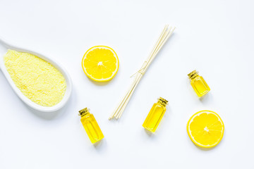 cosmetic spa set with oils and salt white background top view mo