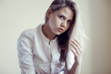Fototapeta premium beautiful young woman at home in the apartment