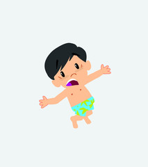 Asian boy in a swimsuit jumping terrified.