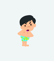 Asian boy in a swimsuit is slightly angry.